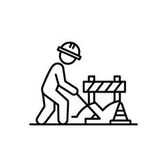 Construction worker directing traffic around a road barrier