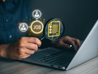 Searching for a job online with a laptop and digital applications