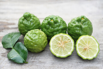 Fresh kaffir limes fruits.  Aromatic Thai herb is used for cooking with sour taste, natural shampoo and homemade cleaners. Known for its citrusy fragrance and traditional medicinal properties.   