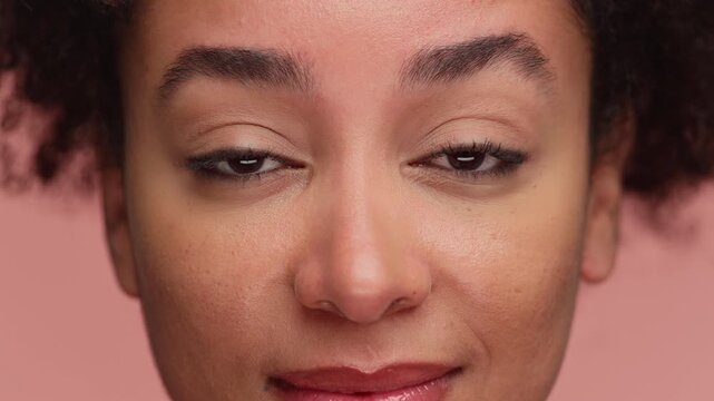 Woman raising eyebrow with confident expression