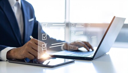 Professional businessman using digital checklist and laptop for efficient task management in modern office