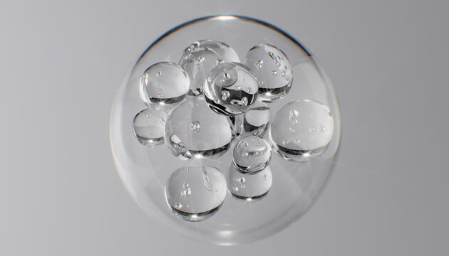 Abstract cosmetic background with glass spheres and bubbles inside a larger orb. Hyaluronic acid, serum, or the molecular structure of a hydrating essence 3d rendering science concept.