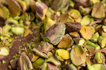 pistachios chopped into pieces, crispy pistachios fried with salt, closeup