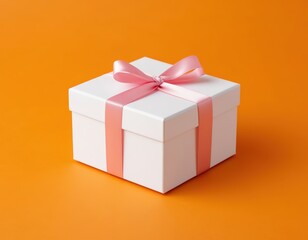 Obraz premium gift box with ribbon on orange background.