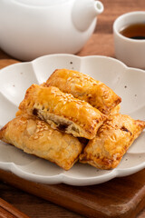 Delicious BBQ pork puff pastry dim sum food.