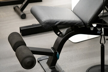 Adjustable incline weight bench for weight training and body muscle building in fitness. Workout bench with padded seat for indoor strength exercise. Home gym equipment