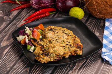 Tasty chicken steak with vegetables