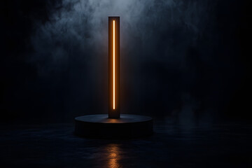 Tall black rectangular object with glowing orange vertical line on dark circular base