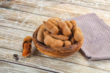 Tropical exotic Tamarind fruit heap