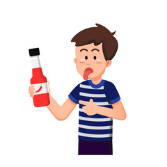 A boy holding a chili sauce bottle with his tongue out reacting to the spicy taste