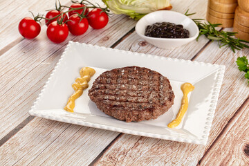 Grilled juicy beef cutlet for burger