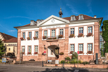 View at the Town Hall building in the streets of Riquewihr in France