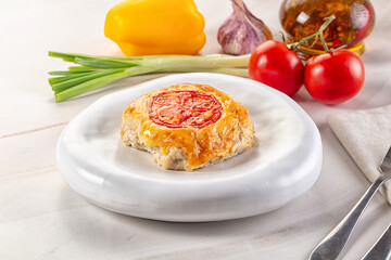 Chicken chop cutlet with cheese and tomato