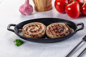 Grilled beef round circle sausages