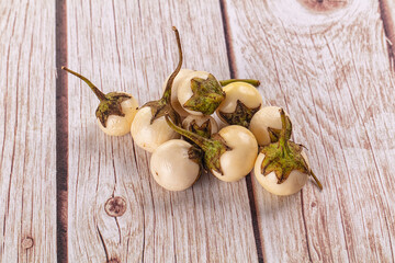 Raw white small baby eggplant