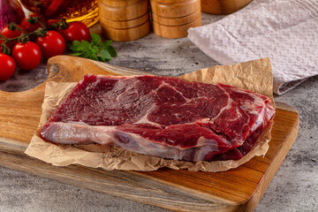 Gourmet raw rib eye steak