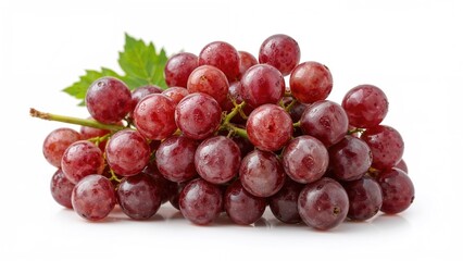 Fototapeta premium Handful of red grapes laid out on a bright background