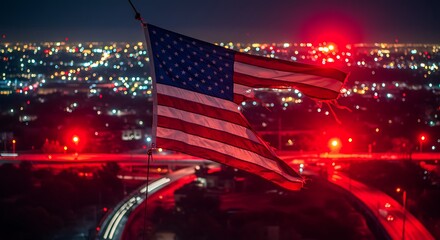 American Flag Waving at Night Over City Lights,Torn US Flag Against the Backdrop of a Blurred Night City Skyline
