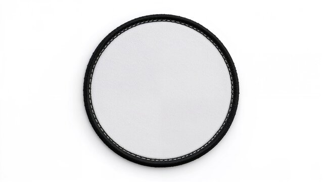 Empty monochrome embroidered round patch model, top-down angle, three-dimensional render. Plain cloth insert for icon patch mockup, separate. Clear stitched circular emblem design.
