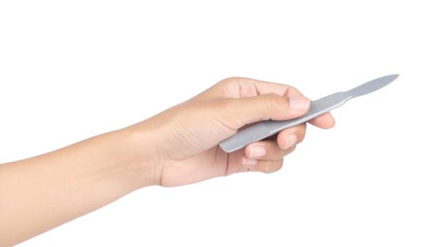 A gloved hand holds a sliver-shaped, light gray tool isolated on solid white background Png format - Powered by Adobe