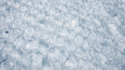 Obraz premium Overhead view of a white, snowy ground