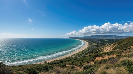 Scenic panorama from a high vantage point overlooking the beach and ocean on a summer day