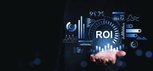 ROI return on investment concept with data analytics and graphs displayed above a hand on dark background in futuristic digital interface style.