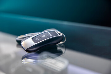 Car keyring and remote control key in vehicle interior.