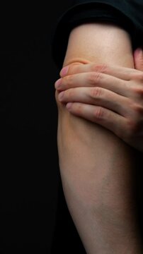 sprain or fracture of arm in adult muscular man in black t-shirt.
Male arm with arthritis or bruise symptoms.
Patient's arm pain due to muscle strain