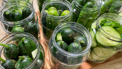 Crisp cucumbers nestled in briny jars evoke a tangy festive pickle harvest for International Day of Pickles
