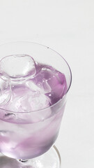 Lavender-infused iced elixir glistens, evoking mystical midsummer rituals and International Color Day celebrations, refreshing and ethereal