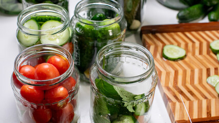 Jars of verdant pickles and vibrant tomatoes evoke garden symphony, capturing Fermentation Day and Green Ramadan's wholesome spirit