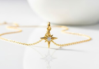 Gold necklace with star pendant and diamond