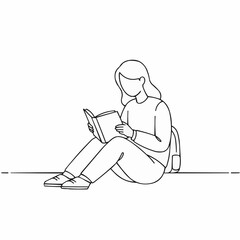 Young woman reading a book while sitting on floor indoors  