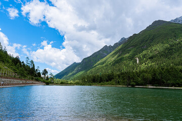Fototapeta premium Beautiful summer landscape of Bipenggou National Park, located in Sichuan Province, China.