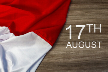 Red and white flag with wooden background, independence day of Indonesia, Indonesian celebration...