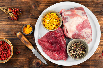 Pieces of raw meat for cooking, flat lay.