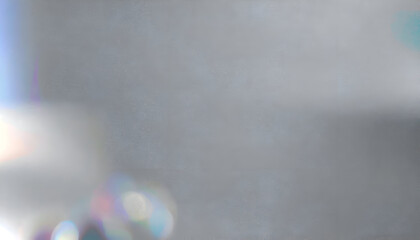 Ethereal Prismatic Lens Flare on a Textured Monochromatic Gray Background