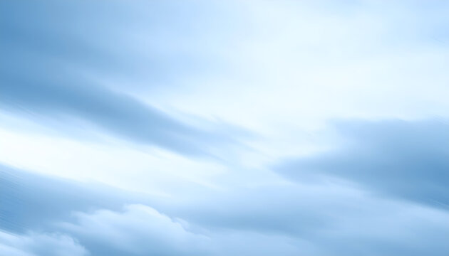 Ethereal Skyward Rush: A Diagonal Blur of Soft Blue Clouds