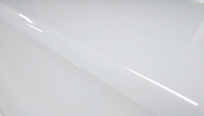 Luminous Reflection on a Sleek, Curved, High-Gloss White Surface