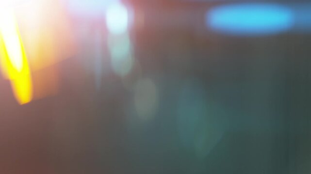 Real Shooted Cinematic Lens Flare Overlay on Black Background at 1000fps Slow Motion.