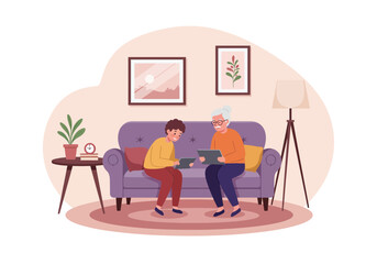 Grandparent and grandchild enjoying quality time together playing a board game on the sofa at home