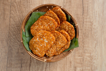 Tempeh, Tempe Goreng or Fried tempeh is Indonesia traditional food, made from fermented soybean seeds. Perfect for recipes, articles or any cooking content.