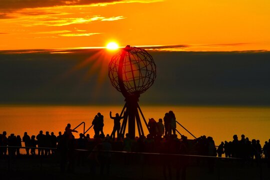 The North Cape (Norwegian: Nordkapp, Coordinates: 71&deg;10&prime;21&Prime;N 25&deg;47&prime;04&Prime;E) - Globe Monument at the edge of the clifftop lit by the midnight sun (Mager&oslash;ya island, Finnmark county, Northern Norway)