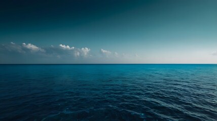 Fototapeta premium Open Ocean Scene with Deep Blue Water and Clear Sky