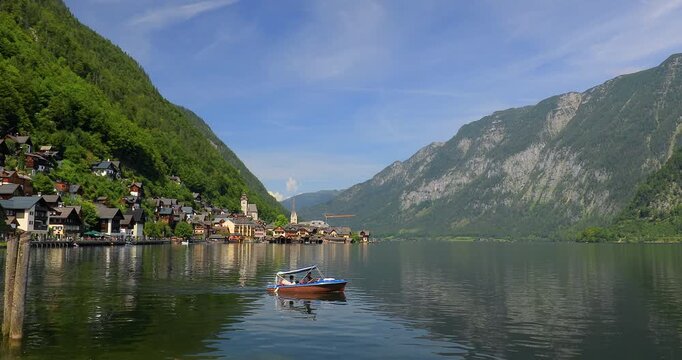 Locked down 4K motion view of Lake Hallstatt in the Austrian mountain region,Hallstatt is a small town in the district of Gmunden,known for production of salt in past history,Hallstatt, Austria,Europe