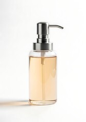 Clear Liquid Soap Dispenser with Silver Pump in Minimalist Bathroom Setting