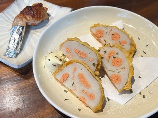 Tempura-style lotus root filled with spicy mentaiko roe, offering a crunchy bite with a savory kick.