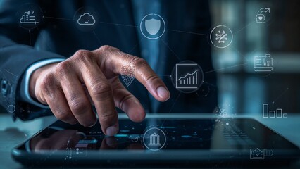 Businessman using a tablet with digital icons representing technology and data analysis