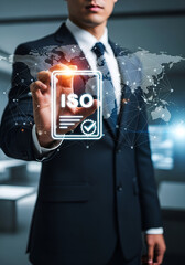 Businessman Touching ISO Certification Icon with Global Network and World Map Overlay